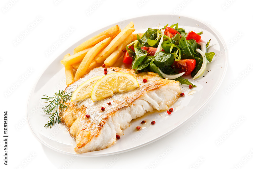 Fish dish - fried fish fillet and vegetables Fish dish - fried fish fillet and vegetables