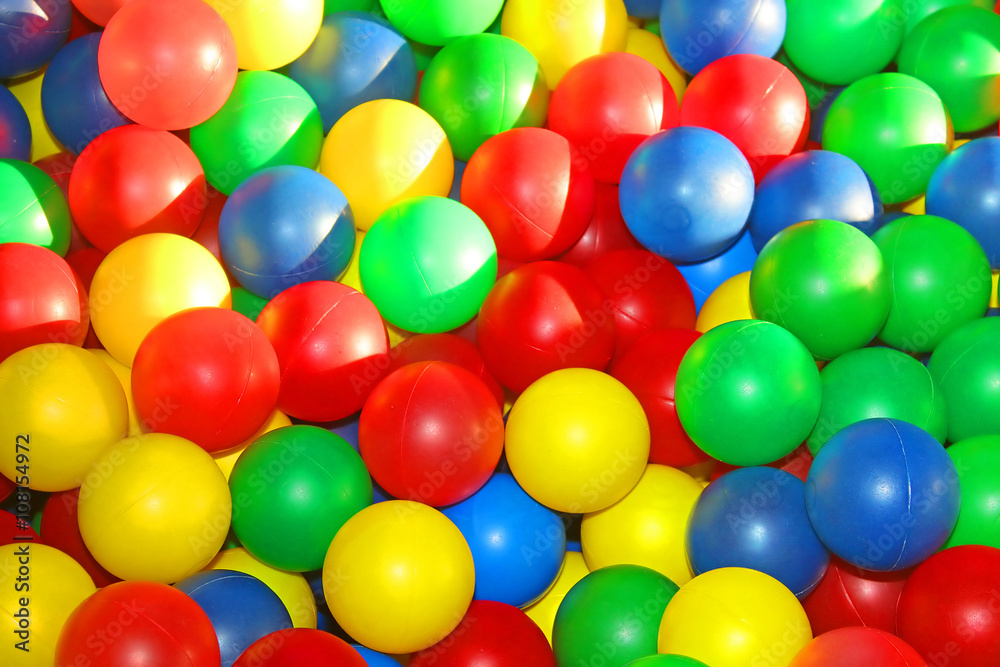 Background, colorful plastic balls on children's playground Background, colorful plastic balls on children's playground