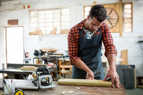 Carpenter working on his craft