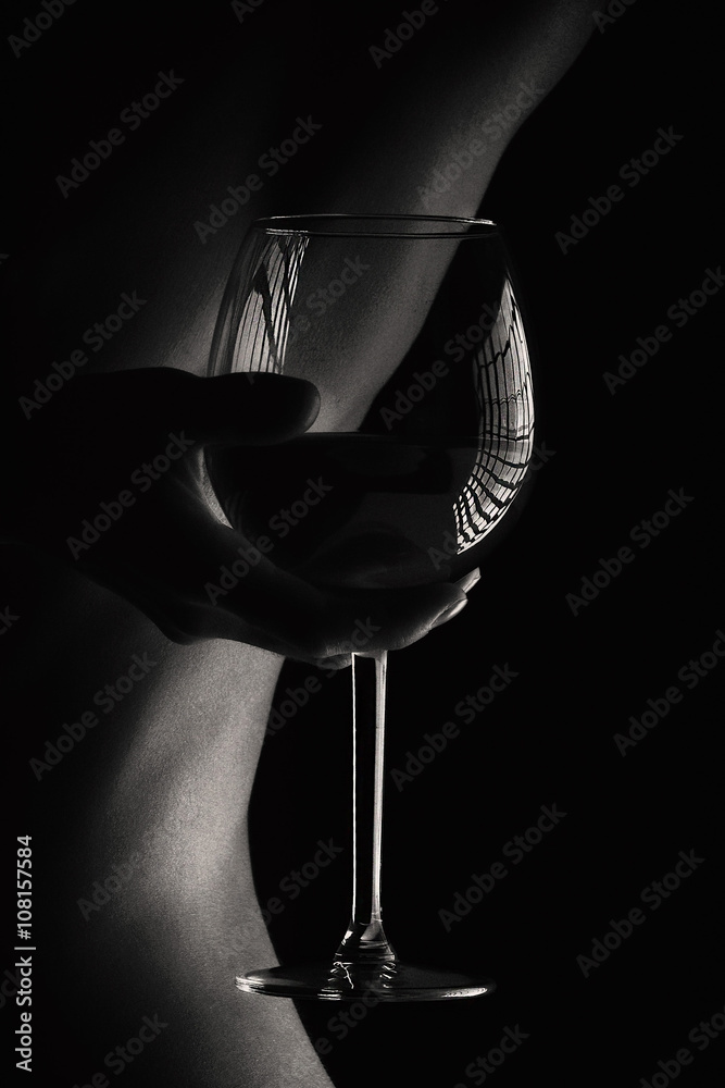 Fototapeta premium glass of wine and the sexy body