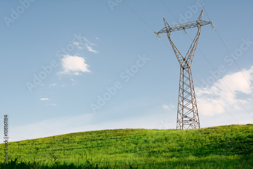 Pylon on green hill © Angelo D'Amico