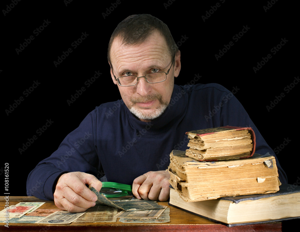 portrait of an elderly man - the numismatist