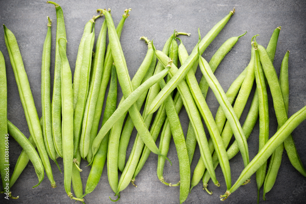 Green beans on a gray background. Green beans on a gray background.