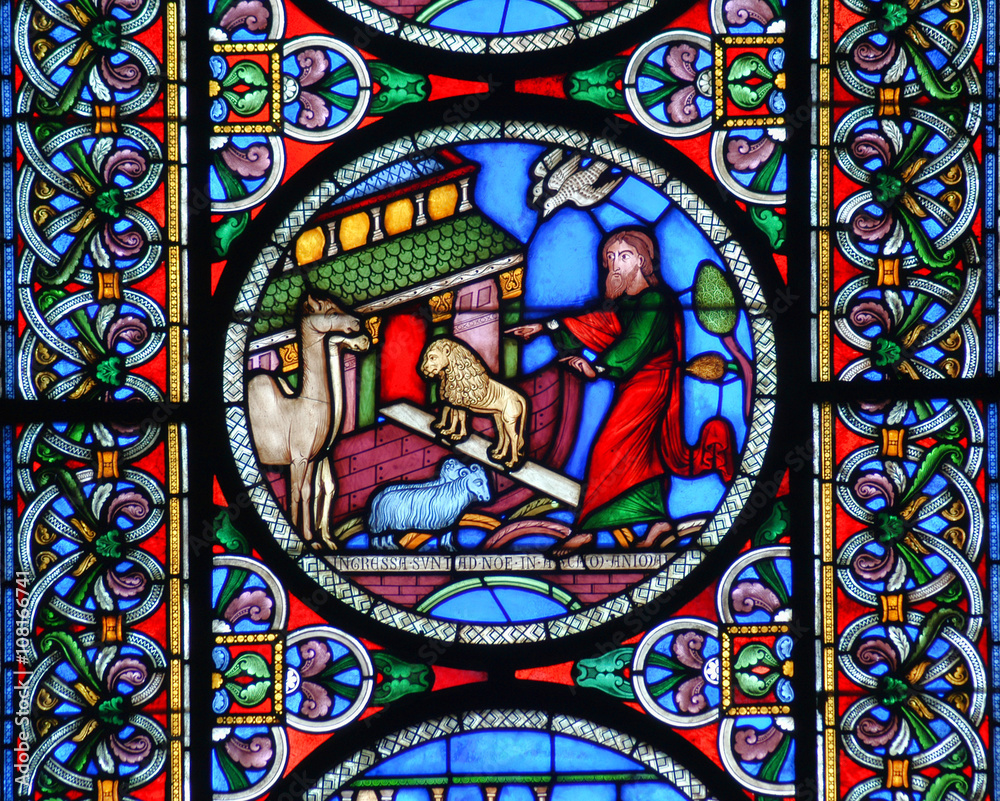 Noahs Ark with the animals going in two by two stained glass window