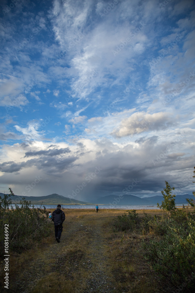 Mountain lake in a cloudy day canda yukon