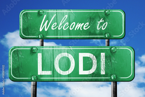 lodi vintage green road sign with blue sky background