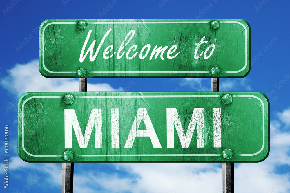 Fototapeta premium miami vintage green road sign with blue sky background