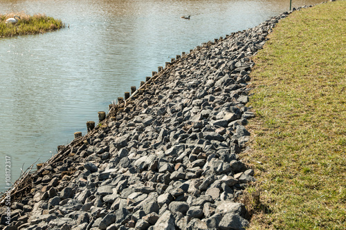 Bank of the river with stones