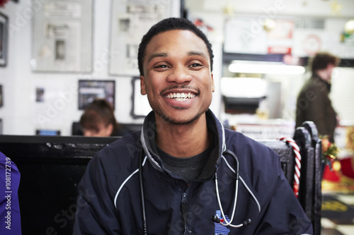 Paramedic smiling in restaurant