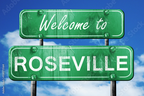 roseville vintage green road sign with blue sky background photo