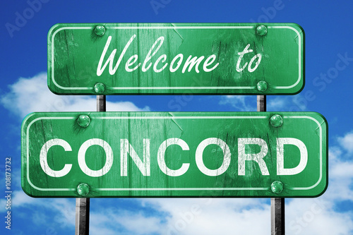 concord vintage green road sign with blue sky background