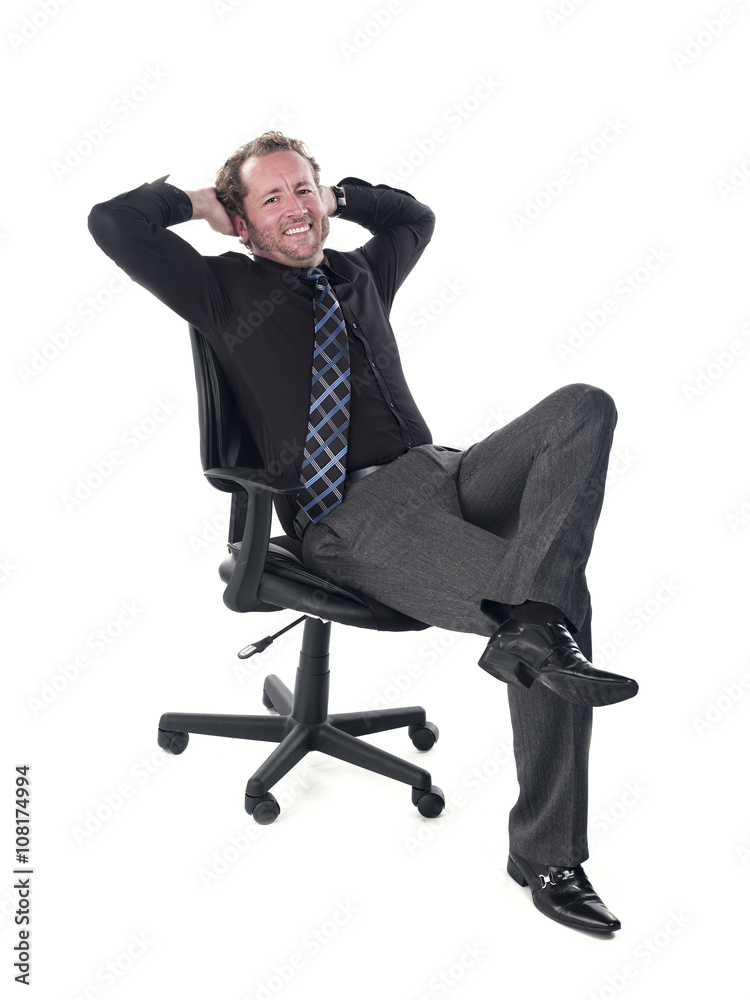 portrait of a smiling young doctor relaxing on chair. portrait of a smiling young doctor relaxing on chair.