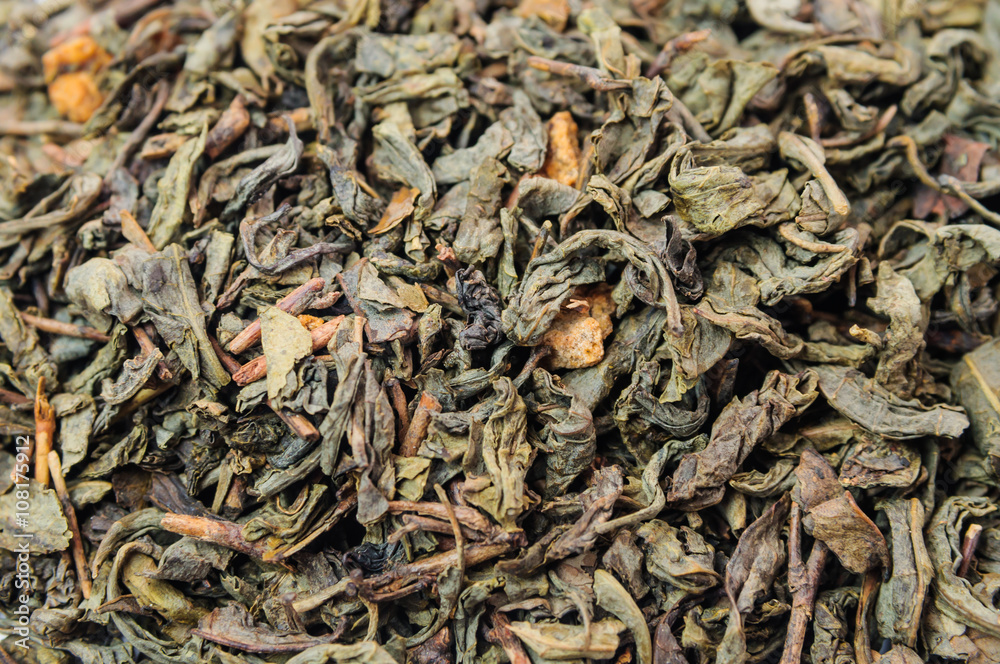 Background of dry green tea with flavors Background of dry green tea with flavors