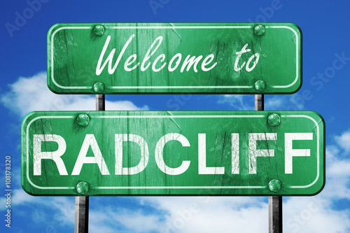radcliff vintage green road sign with blue sky background photo