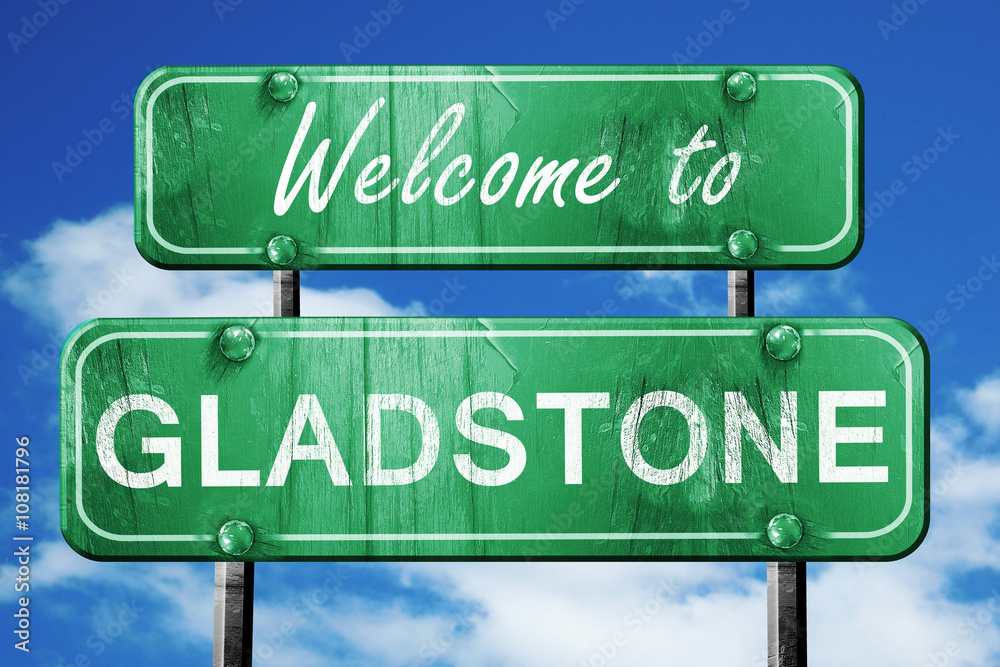 gladstone vintage green road sign with blue sky background