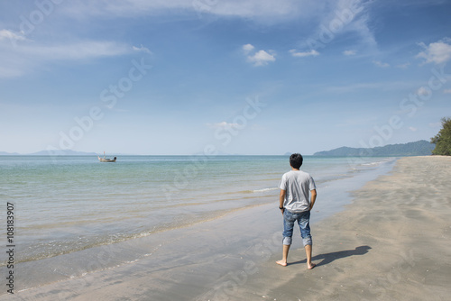 Man looks at the sea