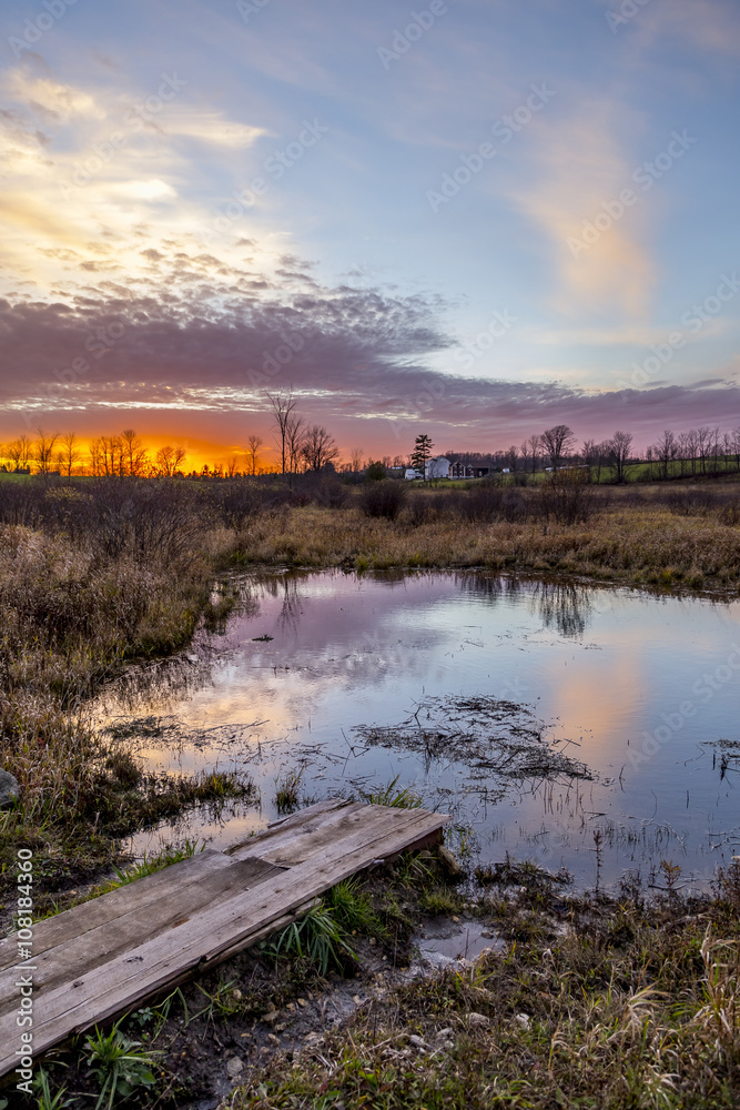 colorful rural sunset scene in late autumn