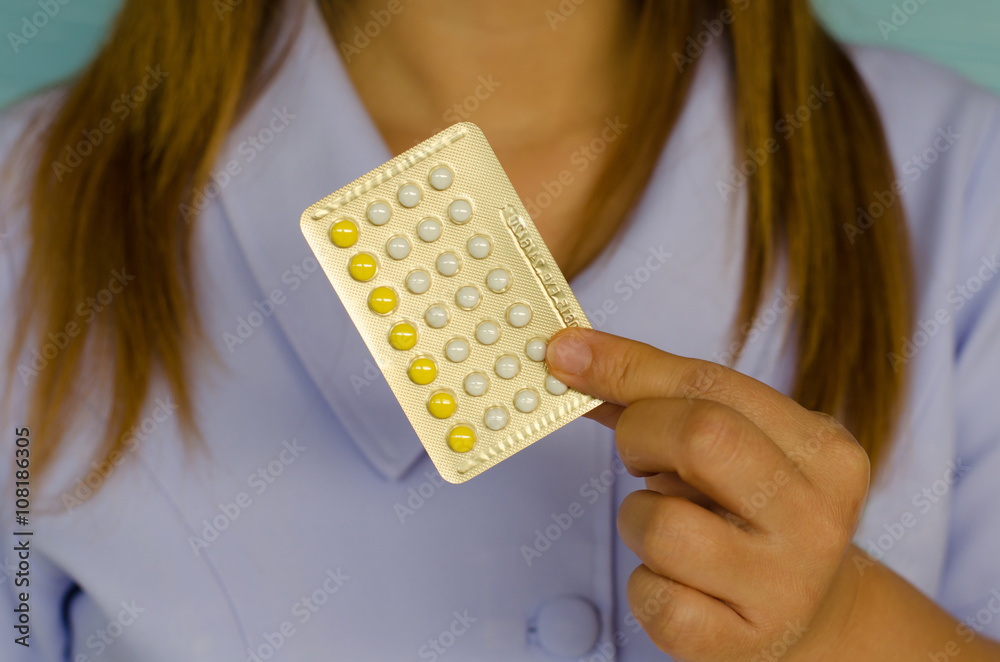 Strip of contraceptive pill in hand Strip of contraceptive pill in hand