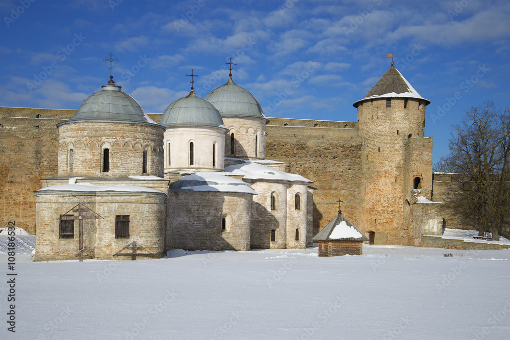 Assumption and St. Nicholas Church at the gate towers, winter day. Ivangorod, Leningrad region, Russia