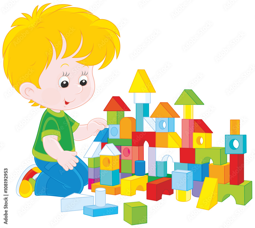 little boy constructing a toy house with colored bricks