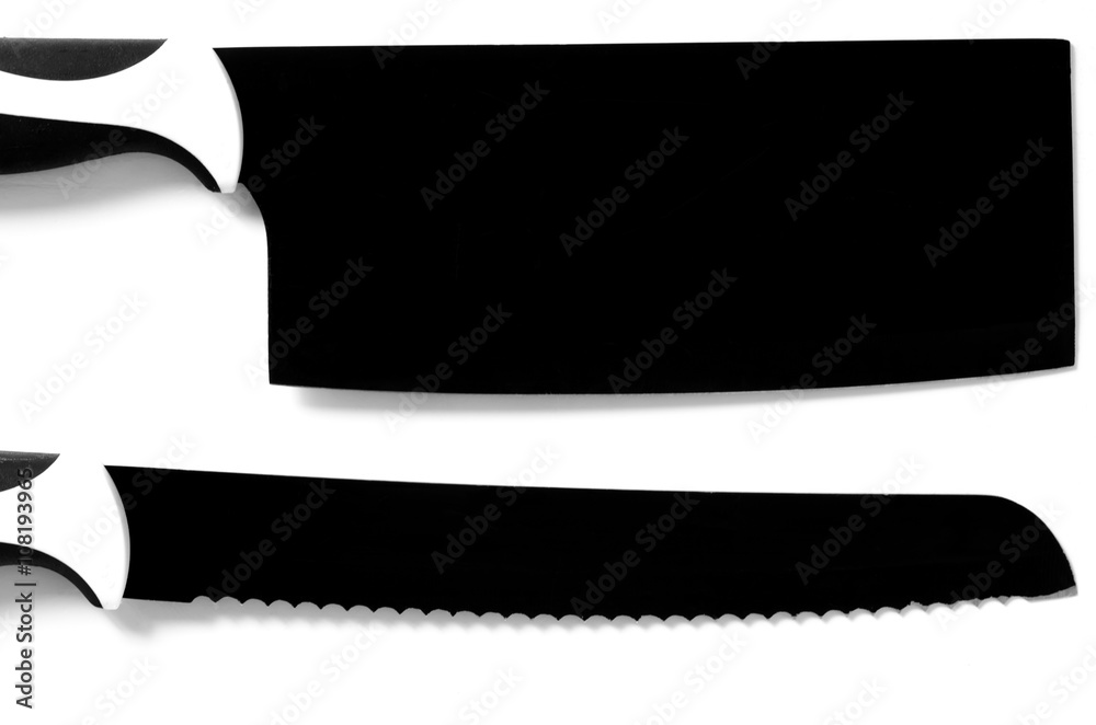 Black chef 's large knife for meat and bread isolated on white Black chef 's large knife for meat and bread isolated on white