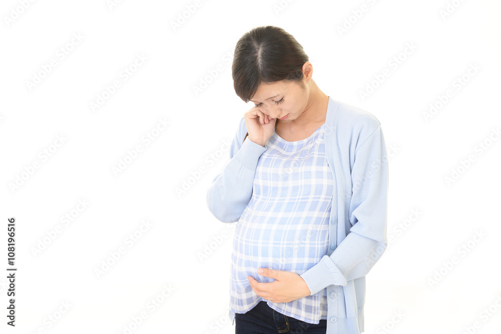 不安そうな表情の妊婦 不安そうな表情の妊婦