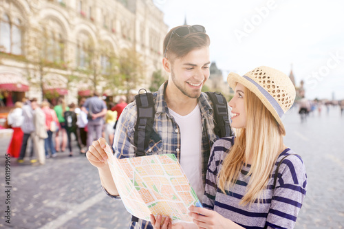 Young couple of travelers i...