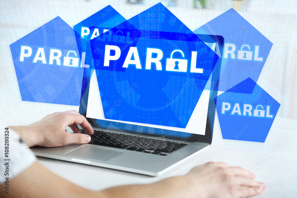 Man working on laptop with icons security on virtual display. Technology, internet and networking concept. Man working on laptop with icons security on virtual display. Technology, internet and networking concept.