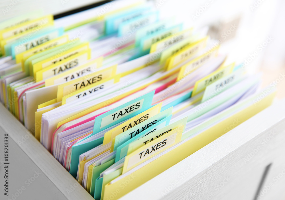 Open drawer with variety of tax documents