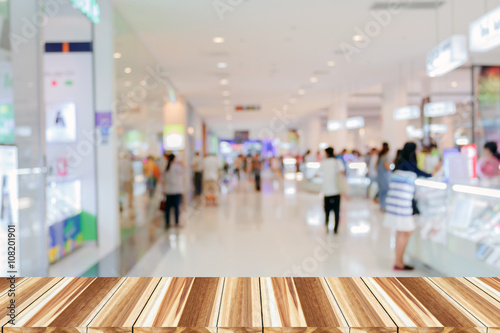 Perspective wood and Empty top wooden shelves of supermarket/mal