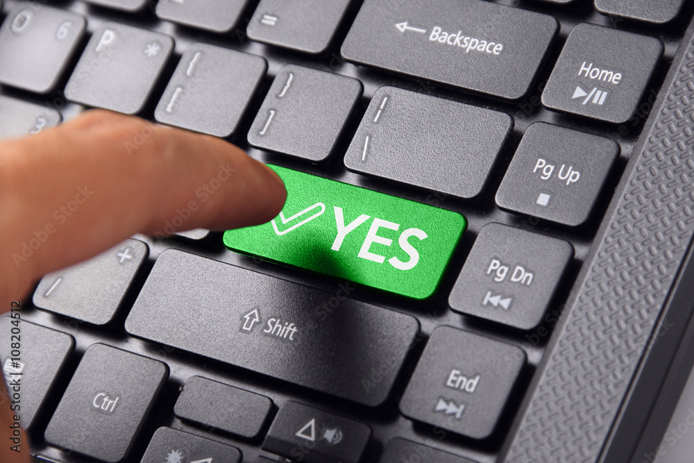 Finger pointing YES on keyboard Finger pointing YES on keyboard