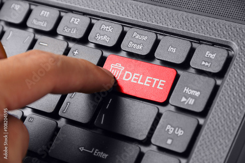 Finger press DELETE button