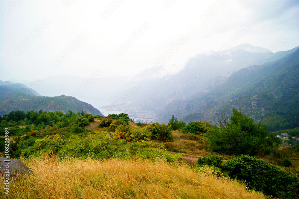 Naklejka premium Cloudy autumn day in the mountains.