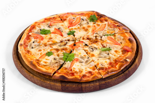 Pizza on a wood plate on a white background