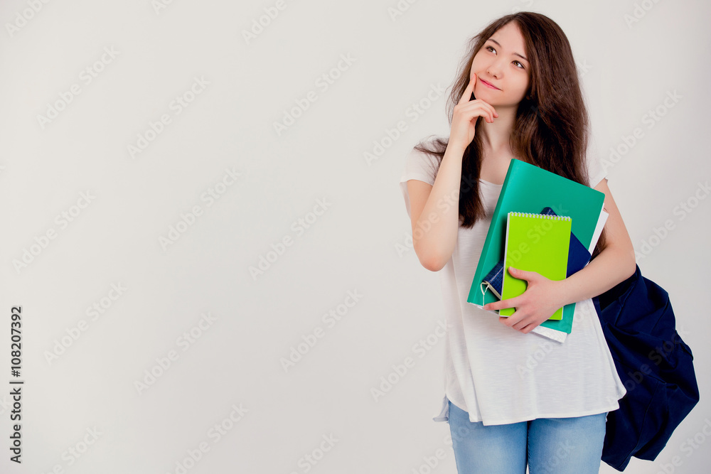 Student with backpack and books on white background. Student with backpack and books on white background.