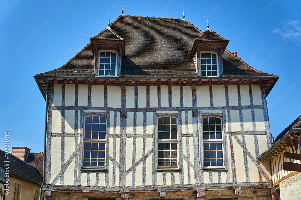 half-timbered tenement in old town of Troyes, France .