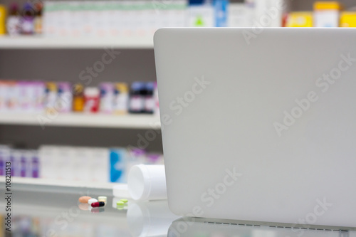 Fototapeta Naklejka Na Ścianę i Meble -  laptop computer in the pharmacy