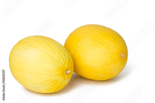 two cantaloupe melons laid