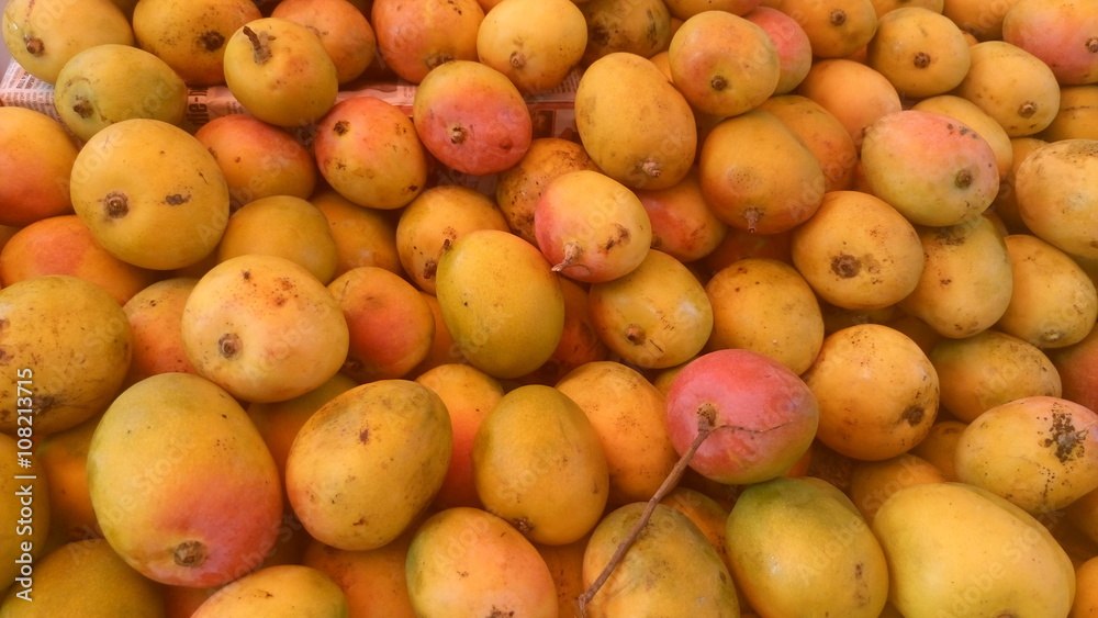 Full frame shot of mangoes for sale Full frame shot of mangoes for sale