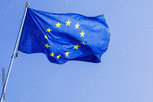 EU flag on a background of blue sky