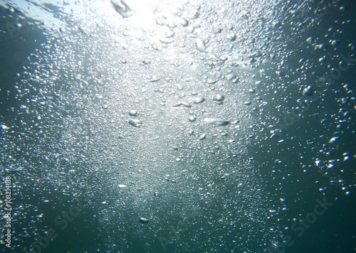 abstract underwater scene with air bubbles under water