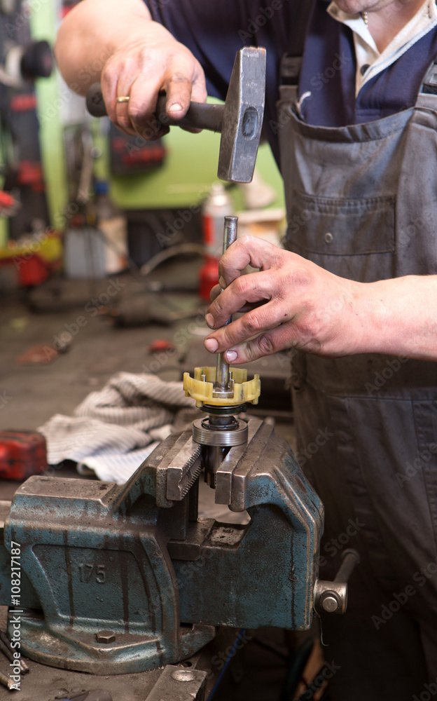 Mechanic repairing electric generator, repair of starter
Mechanic repairing electric generator, repair of starter