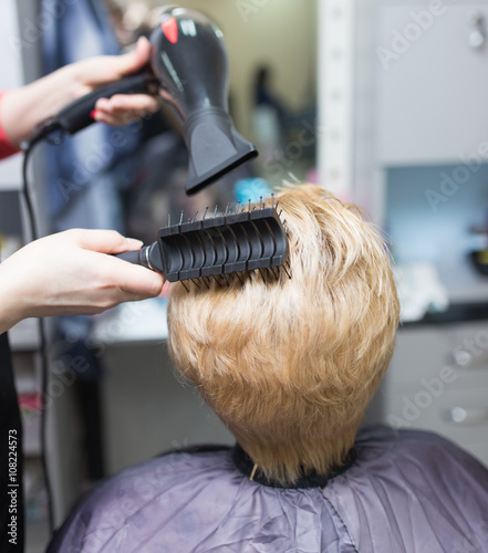 blow-drying in a beauty salon