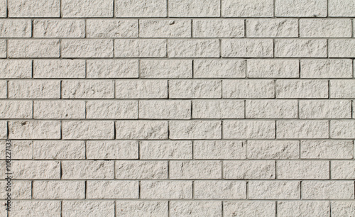 White - light gray roguh brick wall background