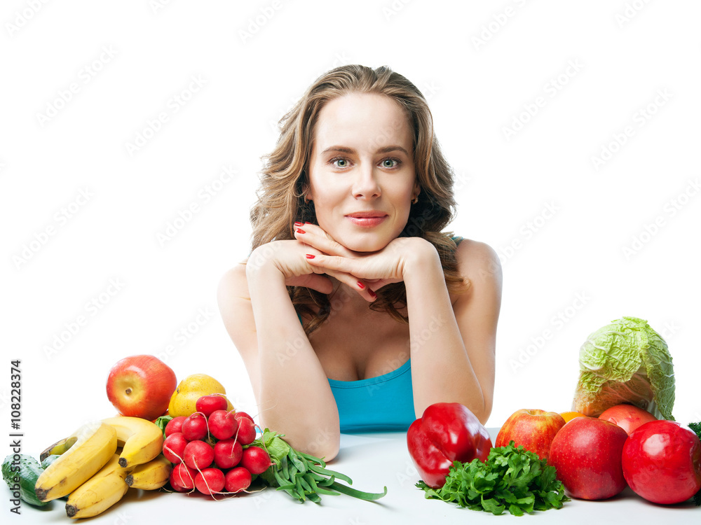 smiling blond girl with fruit and vegetables
