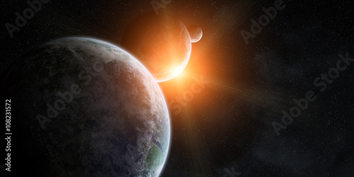 Fototapeta Naklejka Na Ścianę i Meble -  Sunrise over group of planets in space