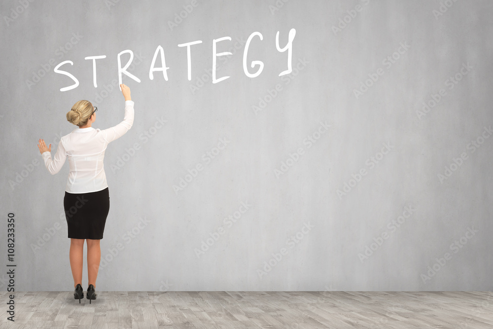 Business woman drawing on the wall. business concept
Business woman drawing on the wall. business concept