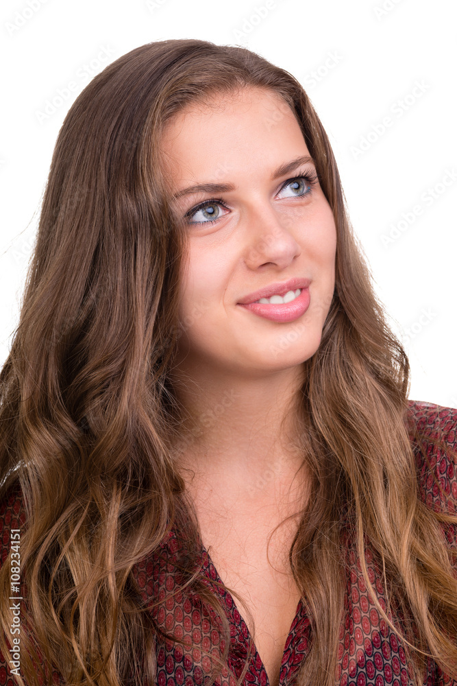 Closeup portrait of dreamy woman isolated on white