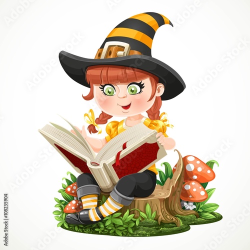 Cute little girl witch sitting on a tree stump and reads magic b