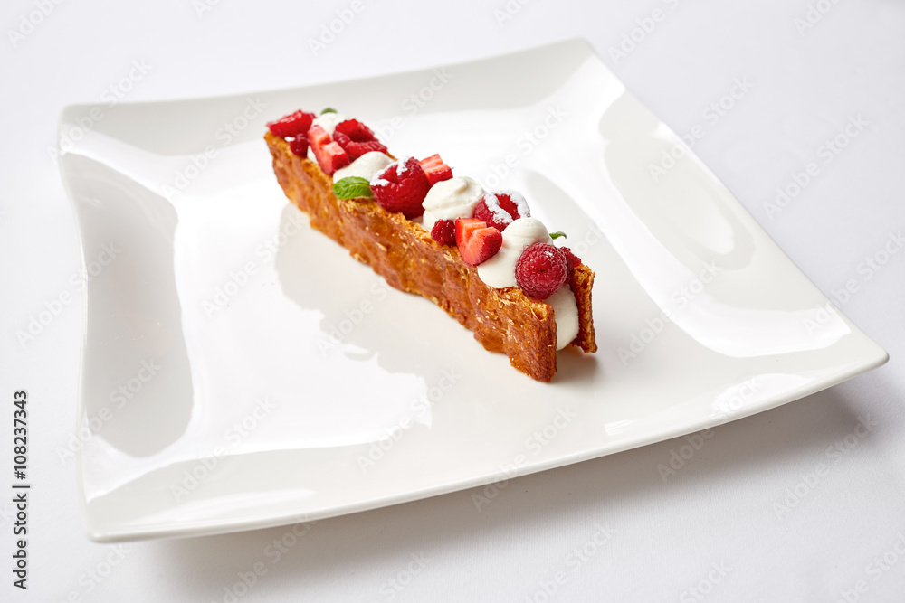 Milfey. dessert of puff pastry, vanilla cream and fruits Milfey. dessert of puff pastry, vanilla cream and fruits